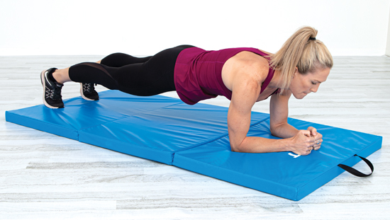 Woman planking on top a HART Sport mat